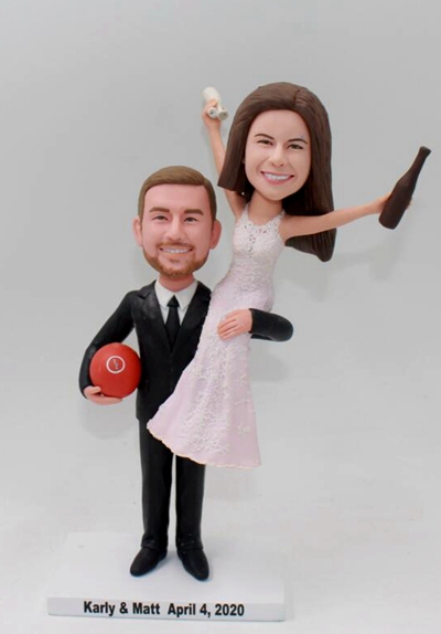 Bride sits on groom's shoulder bobblehead - Click Image to Close