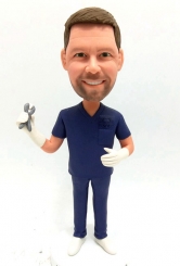 Custom bobblehead dentist in navy scrubs