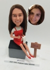 Realtor bobblehead-Sitting on house