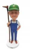 Custom bobblehead Farmer figurine with a hoe personalized gardener figurine