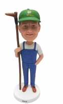 Custom bobblehead Farmer figurine with a hoe personalized gardener figurine